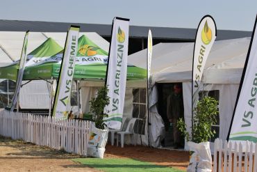 Agricultural event tents with VS Agri banners.