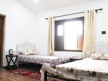 Room with attached bathroom and two bedroom to cater three adult guest in Keralam farm stay Jabalpur
