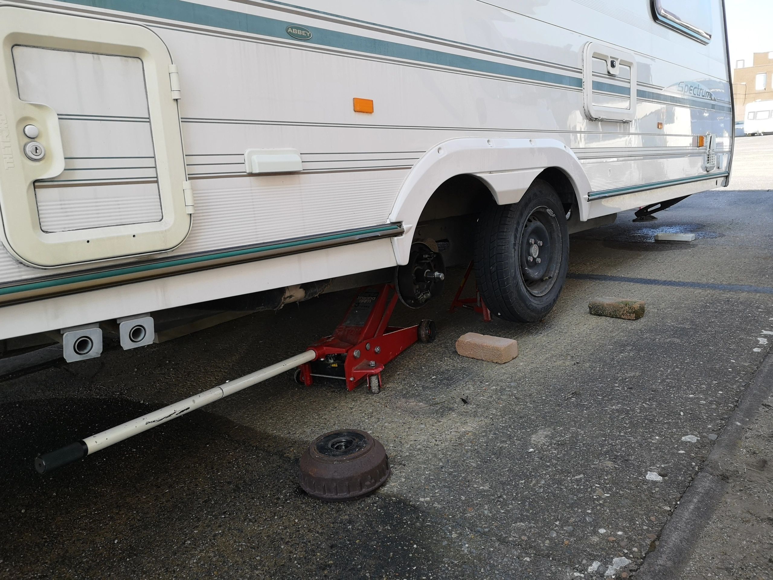 Caravan brakes being checked for safety