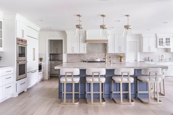White Kitchen with Blue Island 
Double Oven
Glass Cabinets
White Cabinets
Blue Cabinets
Taj Mahal