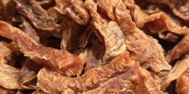 Close-up of dried fruit slices with a wrinkled texture.