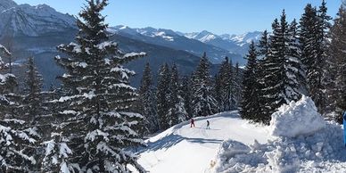 snowy view from la Rosiere of the pistes and snow capped mountains of the tarentaise 