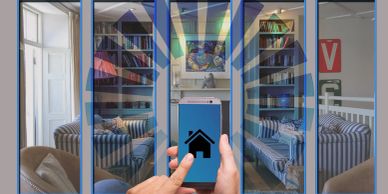 Person controlling smart home with a smartphone.