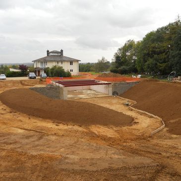 excavated ground for underground garage and driveway