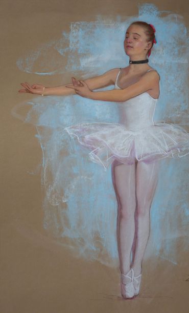 A ballerina posing gracefully in a white tutu and pointe shoes.
