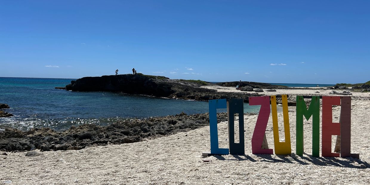 Cozumel sign on the beach