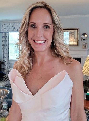 Soft glowing skin Bridal Makeup with a soft black smokey eyeshadow glossy nude lips for summer in NY
