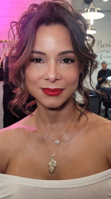 radiant skin gold shimmer eyes natural lashes  a bold red semi matte lip for birthday Merrick ny
