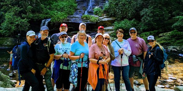 Guests on a Guided Waterfalls Hiking Tour