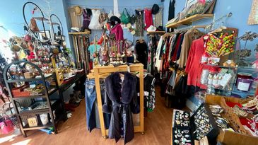 Incredible selection of Vintage and New Designer Clothes and Jewelry. 