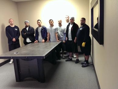 Portland Movers Ready Team Photo.  900 pound concrete slab table move.
