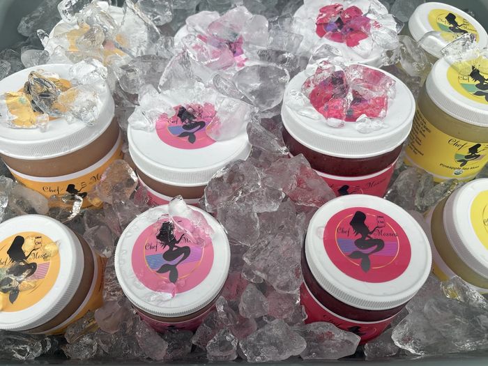 glass jars with different fruit flavored sea moss.