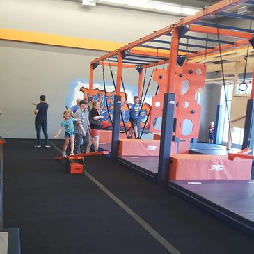 Front half of gym. Youth sized obstacles. Kids Gym. Ninja Gym. Training Class