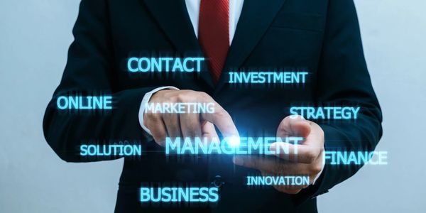 Businessman interacting with digital management and marketing concepts.
