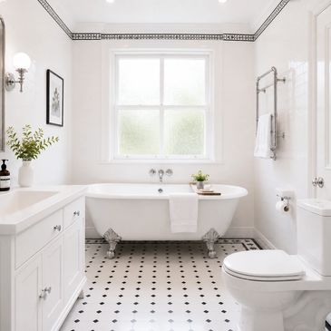 Bright white bathroom with clawfoot tub and patterned floor.