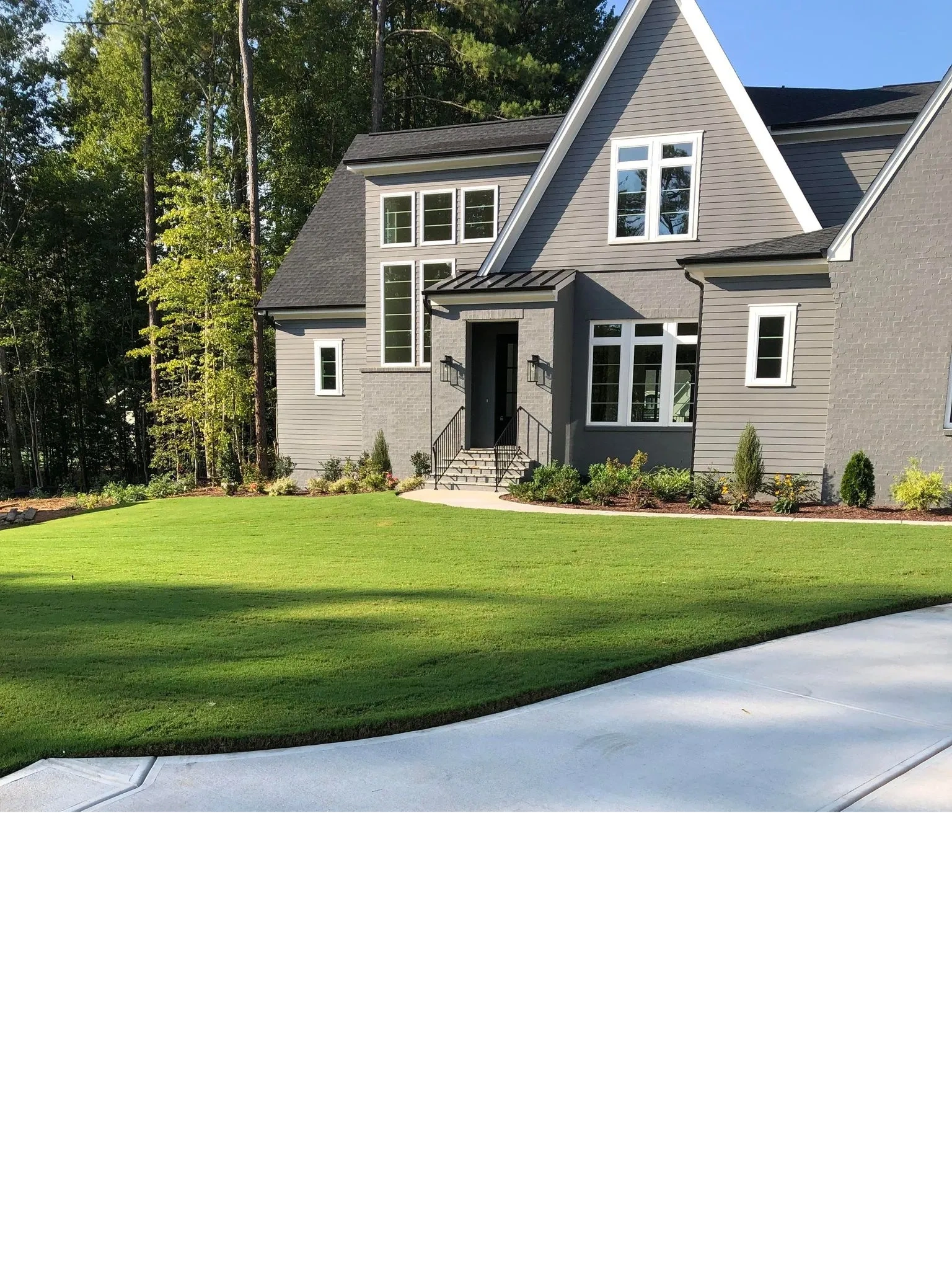 Immaculately manicured lawn showcasing our expert landscaping services in Raleigh