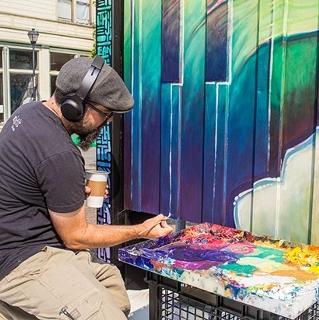 Matt Beard painting in the Eureka Street Art Festival
