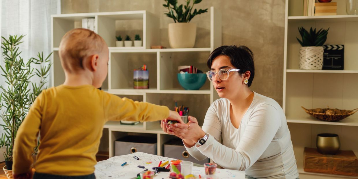 FBI-aba agent working with a child