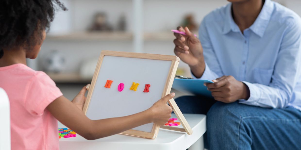 An FBI Agent working with a child