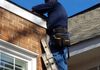 Nathan repairing damaged fascia