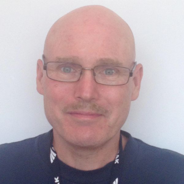 A headshot of Jim, hauling junk