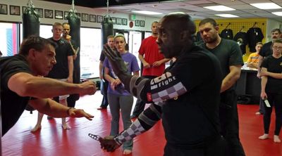 Shihan John Petrone works Knife Defense with Professor David James in CO