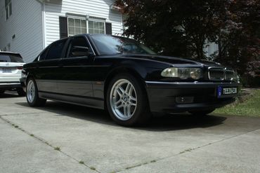 Black BMW E38 waxed