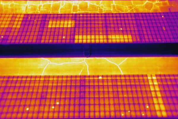 Drone thermal image of hot spots on solar panel canopy