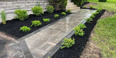 Modern front entrance interlock walkway and garden.