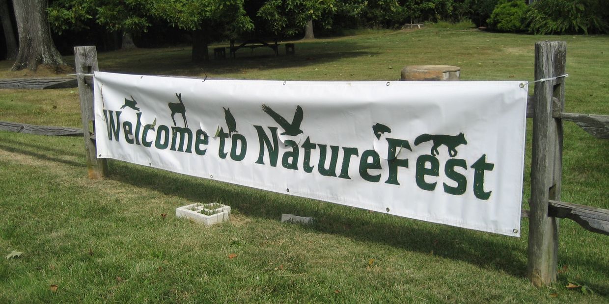 Welcome to NatureFest banner with animal silouettes