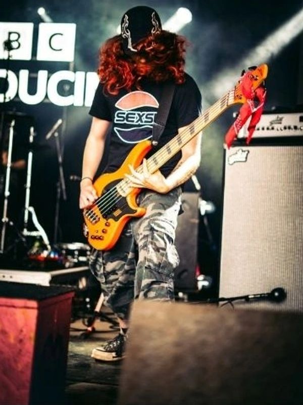 rockstar hairstyle Big blow out Red Curly hair Brighton Hair cut and styled at ciscos karma 