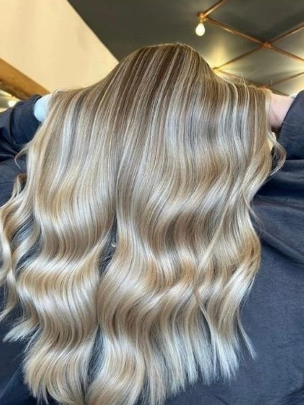 Warm Blond hair colour sexy waves blow dry big blow out hair at Brightons best salon 