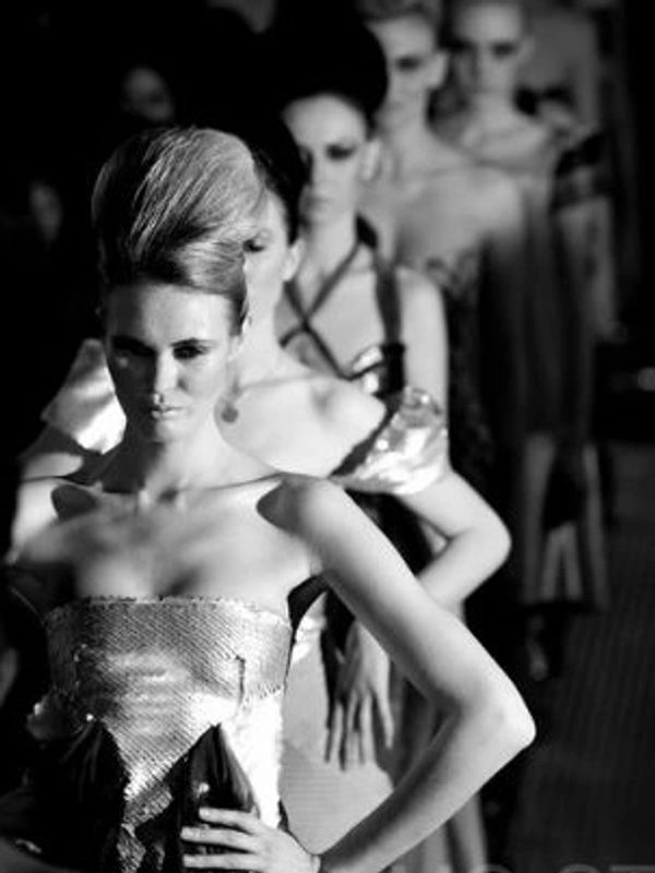 Sexy models on the cat walk all in a line avant garde hair up styled by Brighton best Hairdresser