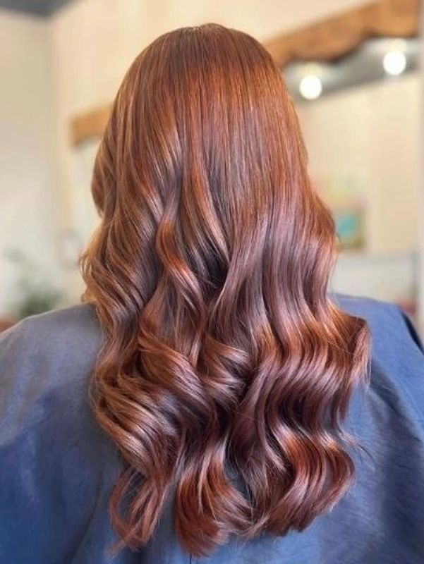Mahogany Hair tonged curled into waves and styled in brighton beast salon 