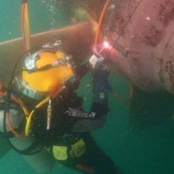 Diver performing weld repairs