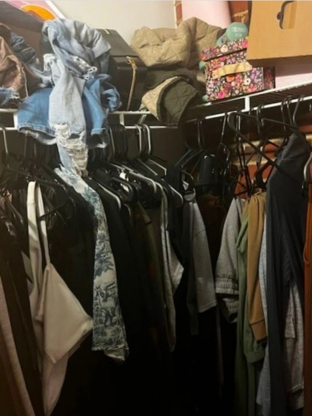 cluttered closet before organization with overcrowded clothing and storage