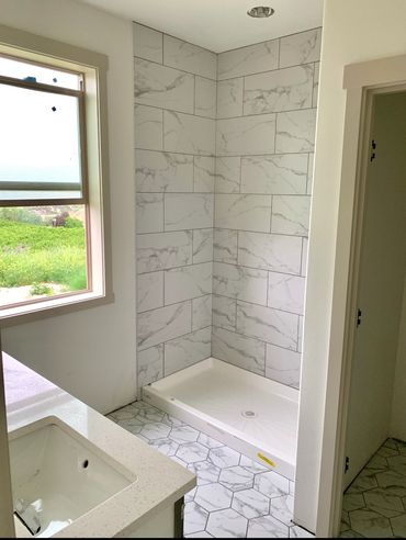 Modern bathroom with marble tile in Yacolt, WA