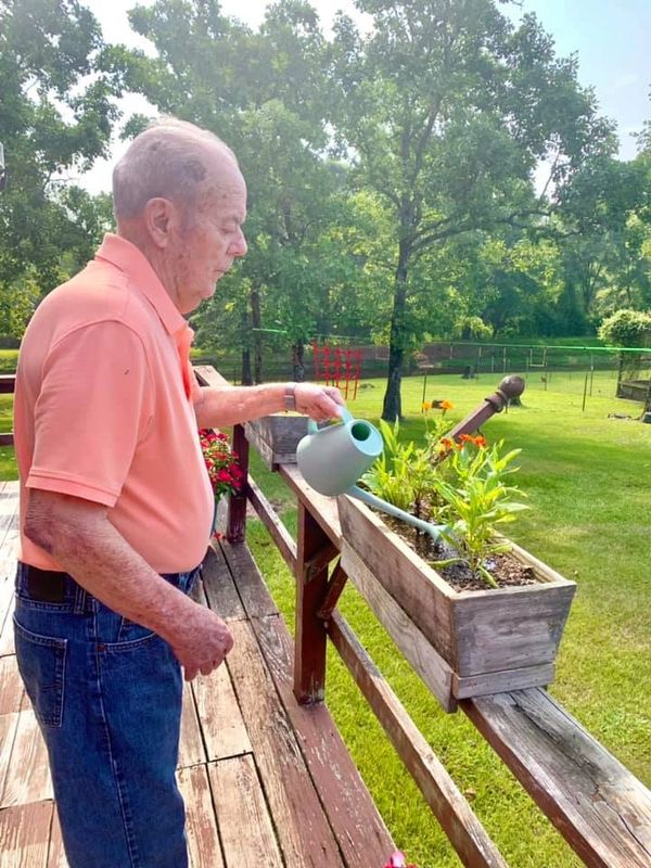 gardening, seniors watering plants, therapy for elderly