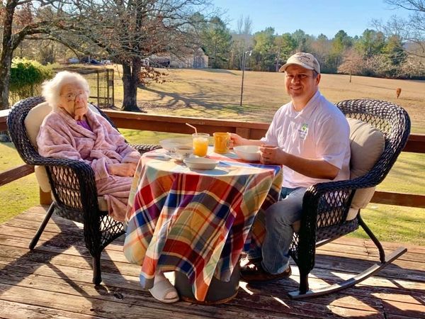special outdoor breakfast with elderly, above and beyond senior care