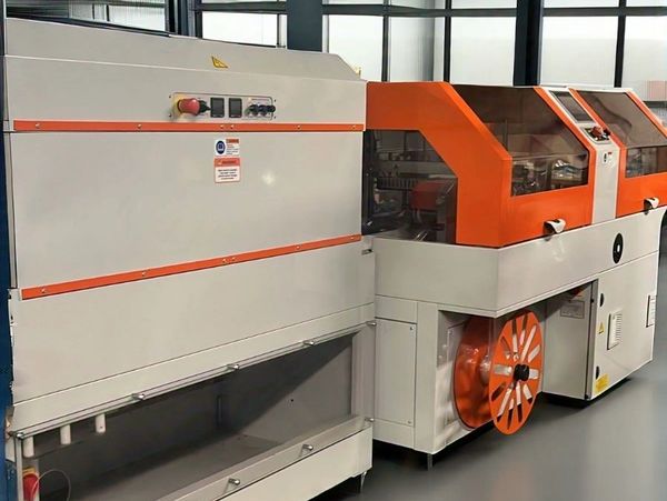 Fully Automatic shrink wrap machine, capable of processing 60 Packages per minute 