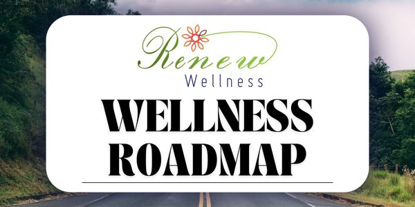 Renew Wellness Roadmap sign on a road background.