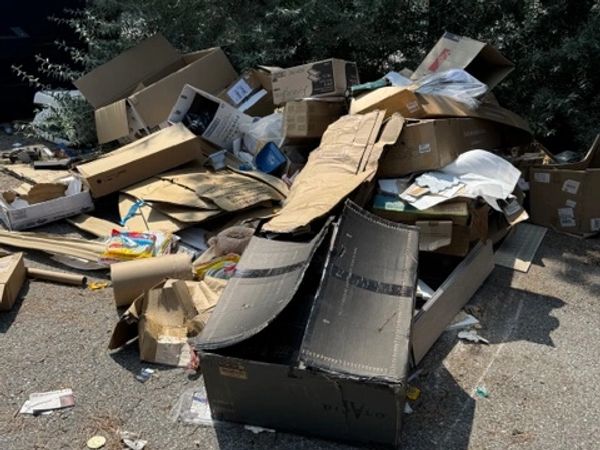 Large pile of cardboard boxes.
