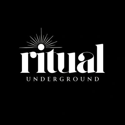 Logo of 'ritual underground' with a sunburst design above the letter 'i'.