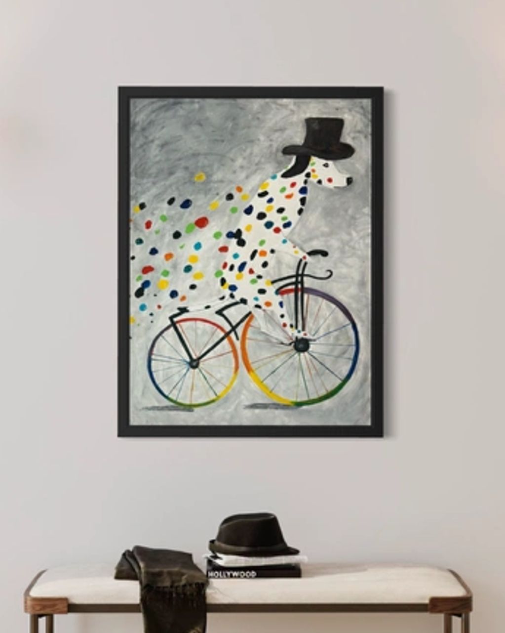 Painting of a spotted dog riding a bike with a top hat.