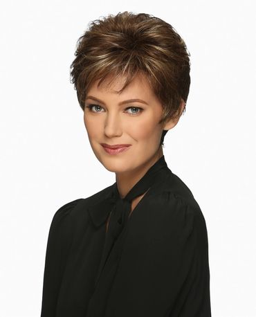 Professional portrait of a woman with short brown hair and a black top.