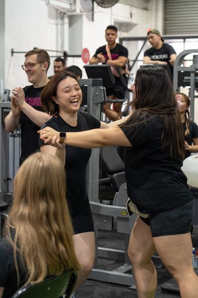 Celebrating win at powerlifting competition.