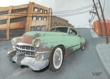metal art vintage 49 cadillac car on road with city buildings