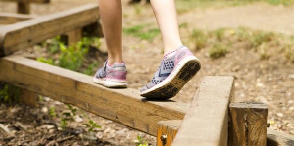Child walking on Balance Beam