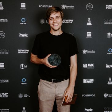 Harry winning an award at the Queensland Music Awards