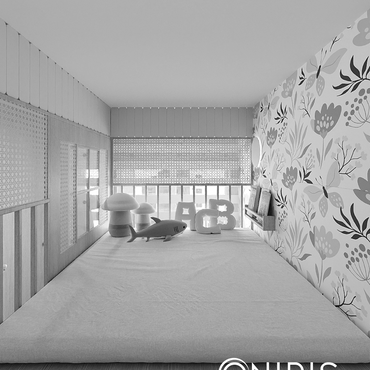Minimalist bedroom with floral wallpaper and soft toys on the bed.